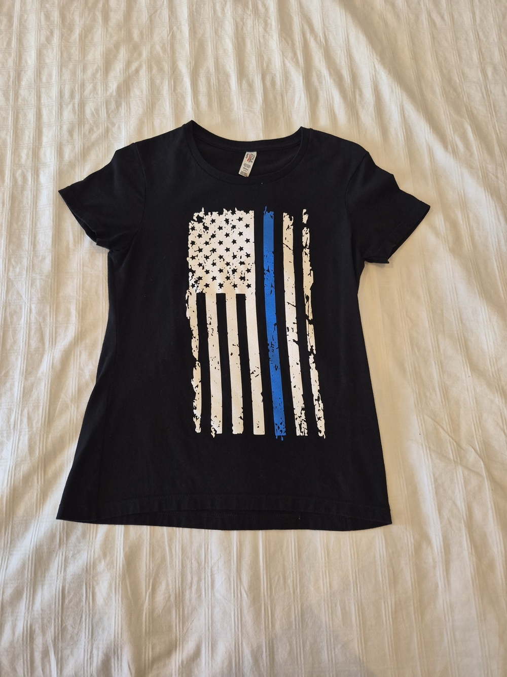100% Cotron Alstyle Black Tee with White and Blue Thin Line Flag Graphic